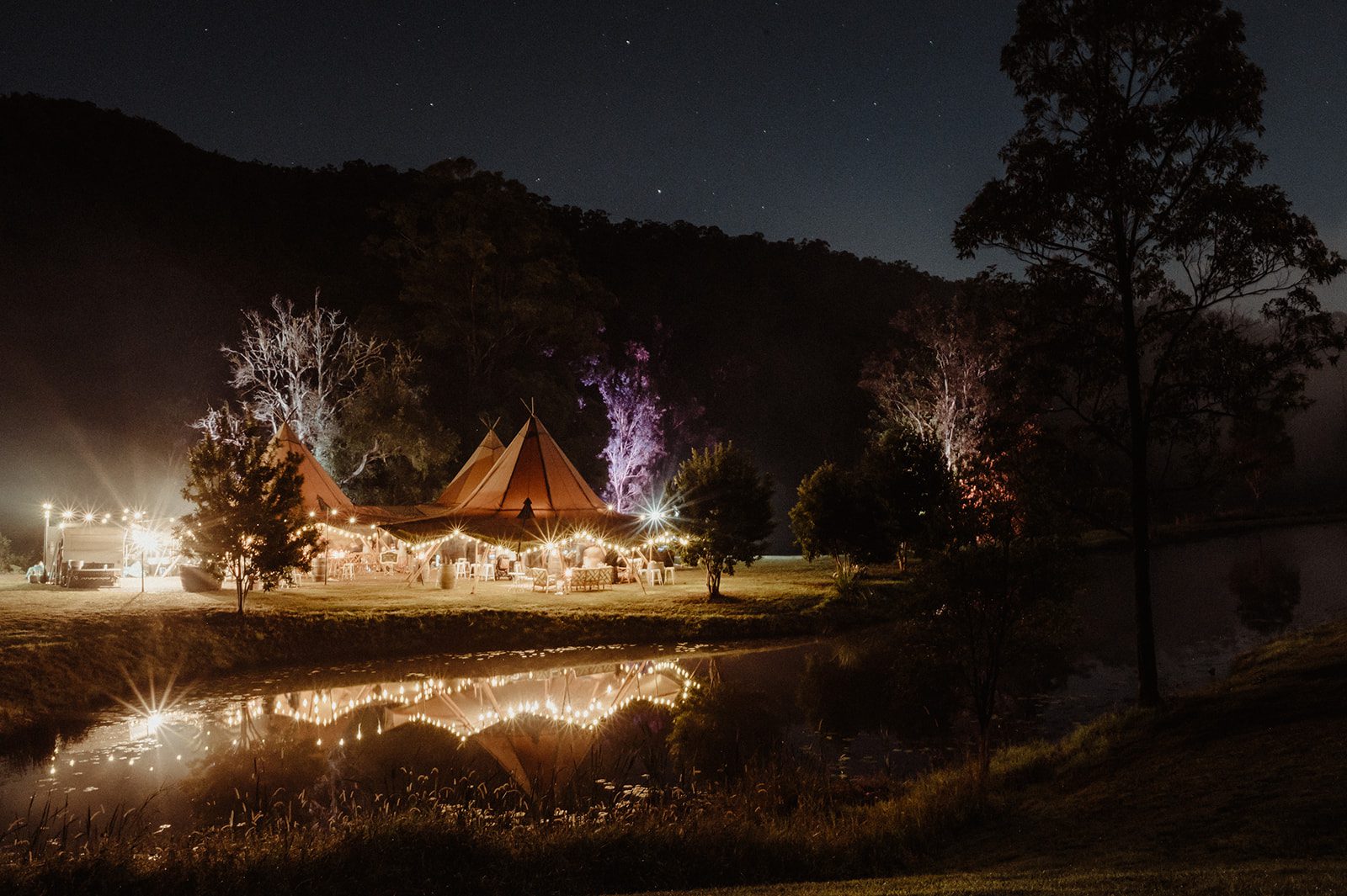 Gorgeous tipi farm wedding, after dark lighting